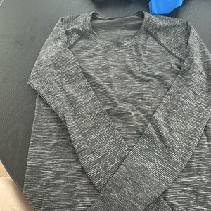 Swiftly Tech Long-Sleeve Shirt
Waist Length